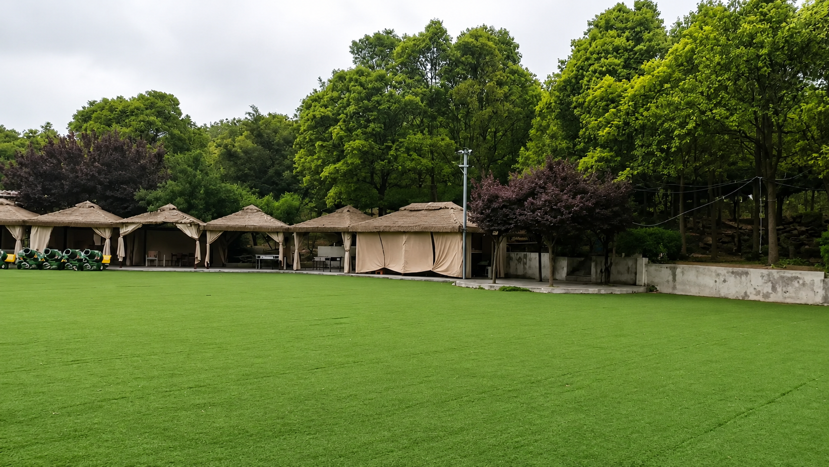 Team building activity venue · thatched pavilion and woodland lawn